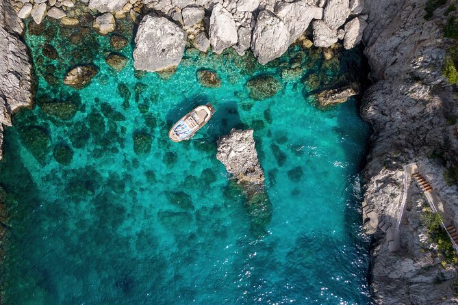 3-hour private boat tour of Capri - Stop 4: I Faraglioni stacks (about 10 minutes, included)