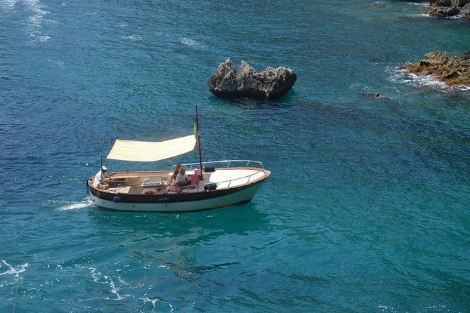 4 Hour Boat Tour To Discover Capri - Sailing past Faraglioni: Stella, Mezzo, and Scòpolo