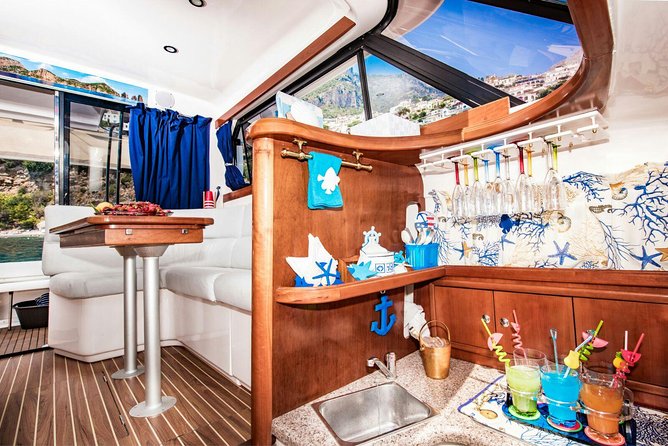 Amalfi Coast by Boat - Marina di Praia Beach: coral-fishing stories and a quieter stop