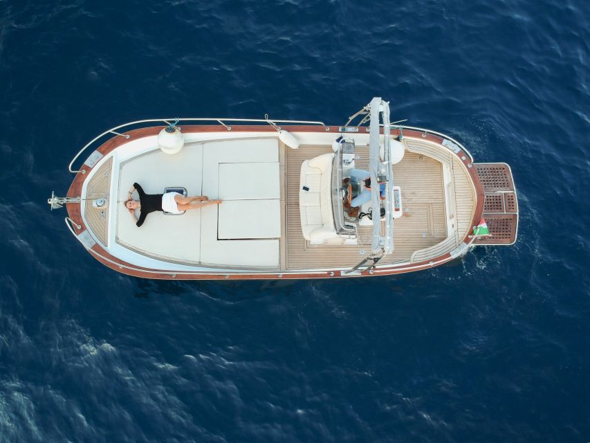 Amalfi Coast: Private Boat Trip with Prosecco and Snorkeling - Praiano’s Pirates Grotto and Positano’s In and Out grottos: the day’s standout payoff