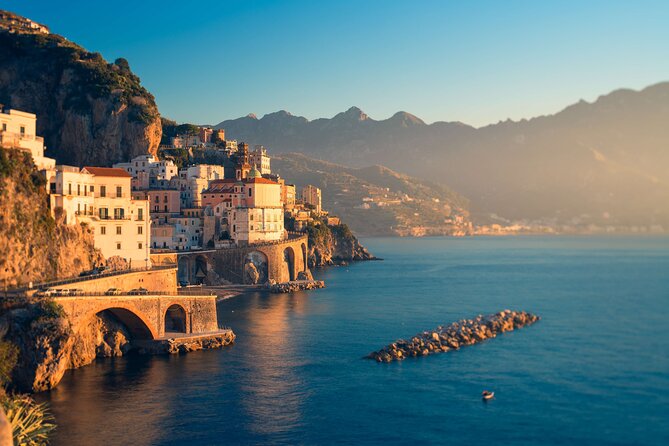 Amalfi Coast: Sunset Boat Tour with Fruit & Drinks | Small Group - From Amalfi out past sea caves: Saint Andrew Grotto and the Arc of Lovers