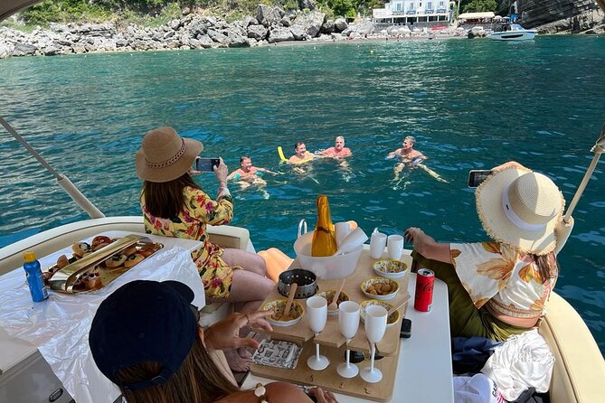 Blue Grotto and Capri by Private Boat Tour - First Stops on the East Side: Spiaggia Marina Grande and Bagni di Tiberio