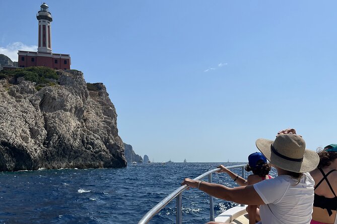 Capri and Blue Grotto Private Boat Tour - Starting your day on Capri’s beaches: Marina Grande and Bagni di Tiberio