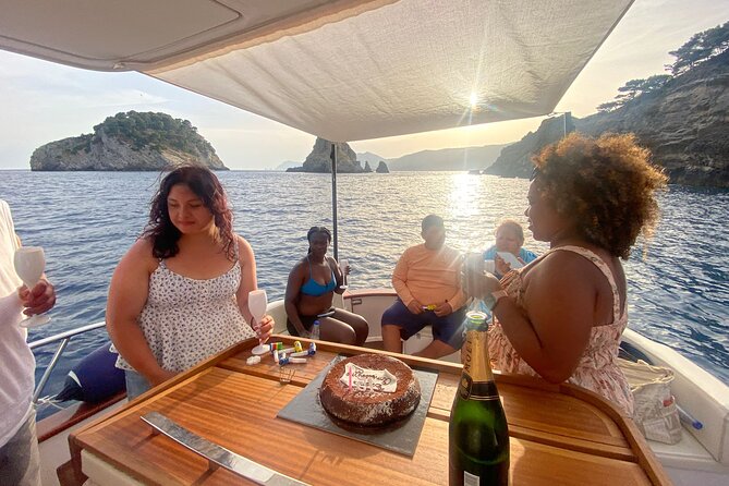 Capri and Blue Grotto Small Group Boat Tour - Heart Cave, Punta Carena, and the sunset lighthouse mood