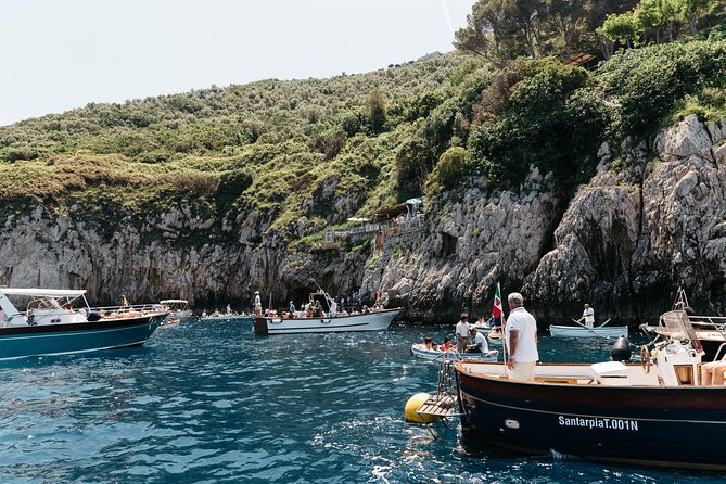 Capri & Blue Grotto Semi Private Boat Day Trip from Sorrento - The morning by boat: grottos, cliffs, and quick scenic stops