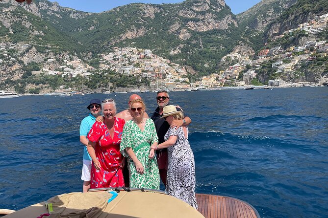 Capri Boat Tour and Blue Grotto Visit - Stop 2: Bagni di Tiberio near Roman-era cliffs
