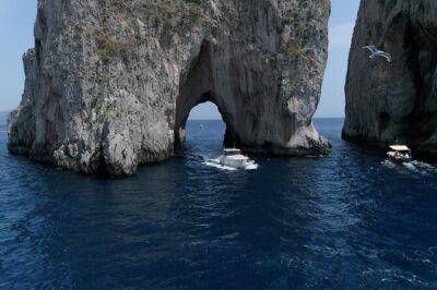 Capri Boat Tour from Sorrento - Speedboat 37ft - Stop 1 at Bagni Regina Giovanna: a quick photo moment on the Sorrentine edge