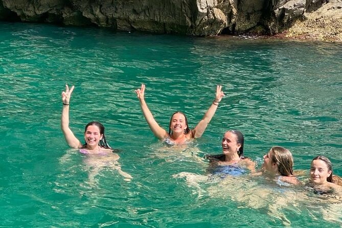 Capri Complete Package-Small Group Boat Tour and Transports - Marina Piccola Swim: Snorkeling Gear, Bottled Water, and Limoncello