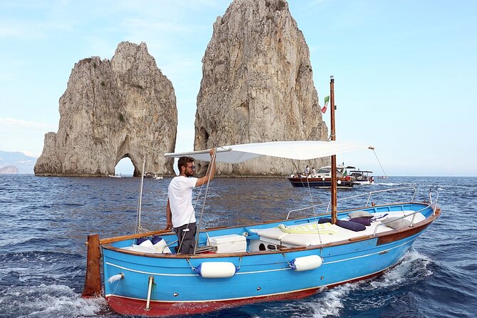 Capri enjoy the Dolce Vita by boat for 4 unforgettable hours! - Stop 3: I Faraglioni for that central opening and easy photo angles