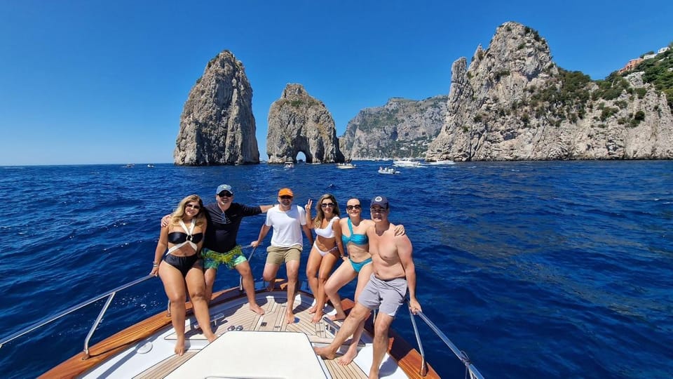 Capri: Exclusive Boat Tour of Hidden Gems with Swimming - Swimming stops with masks, towels, and crowd control