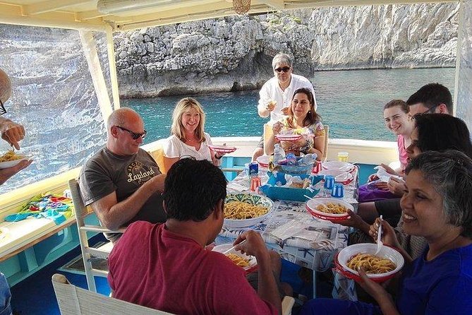 Capri Fishing Excursion with Snorkeling and Lunch from Sorrento - Capri cruise around the island: the views come in waves