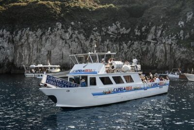 Capri One Day: Visit the Island by Sea and Land with Blue Grotto - Capri by Boat: Faraglioni, Arch of Love, and Punta Carena
