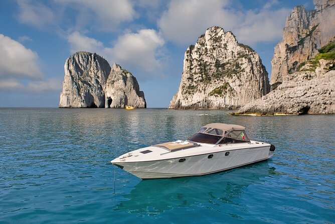 Capri Premium Boat Tour and City Visit Free Bar and Aperitif - Snorkeling and swim breaks: easy setup, active scenery