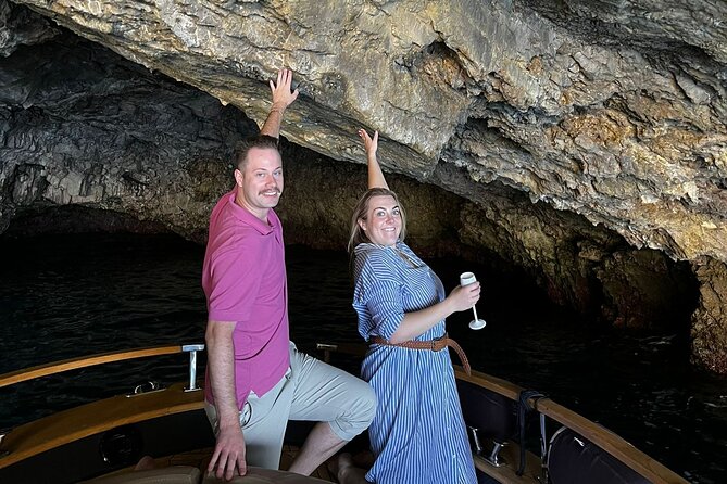 Capri Premium Boat Tour and City Visit Free Bar and Aperitif - Stop by stop: Capri’s coastline, lighthouses, and sea-cliff icons