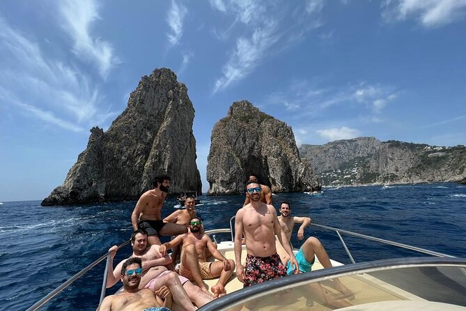 Capri Premium Private Boat Tour + City Visit - Roman-Edge Views: Spiaggia Grande and Bagni di Tiberio