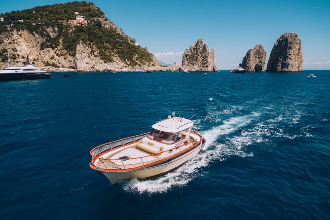Capri Private Boat Day Tour from Sorrento, Positano or Naples - Marina Piccola, Faraglioni, and Capri Views From the Water