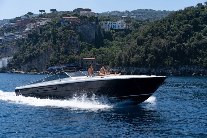 Capri Private Yacht Tour from Sorrento, Capri & Positano - Faraglioni Rocks and Marina Piccola Views: The Cliff Icon Shots