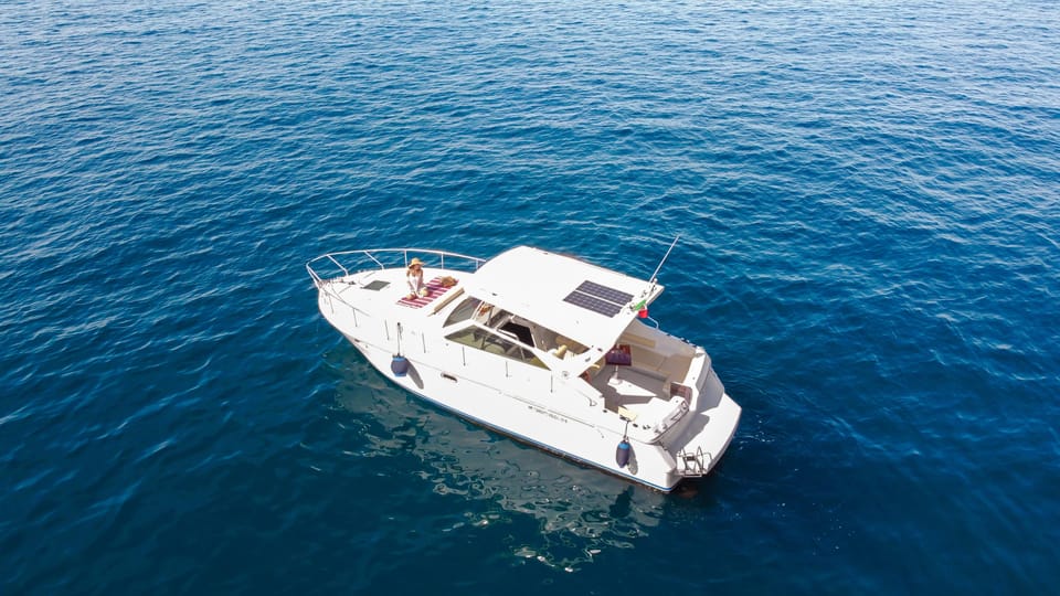 Capri: shared boat tour from Sorrento - 7 hours - Cruise-by details: Punta Tragara, the lighthouse, and the Blue Grotto area