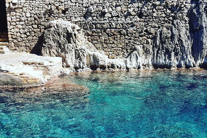 Capri Small-Group Boat Day Tour from Sorrento - White Grotta and the second swim: the statue-and-colors segment