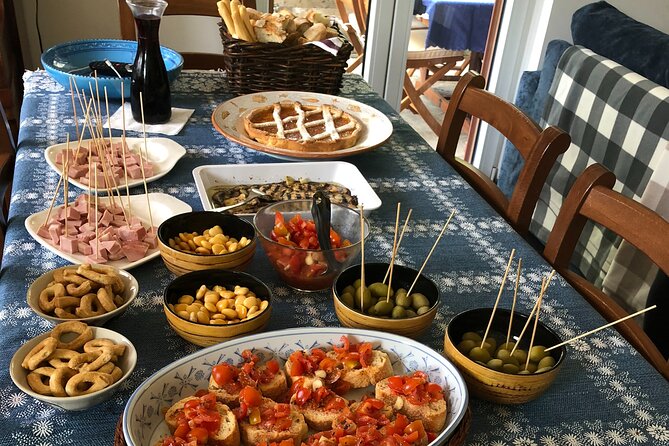 Cook Like a Local: Craft a Neapolitan Feast in Sorrento - The meal on the patio: eating what you made