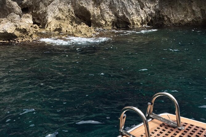 Exclusive Boat Tour to Capri with Swim Stop and Aperitif - The cruising portion: east-to-west Capri highlights
