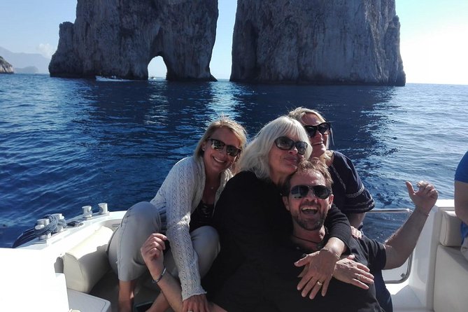 Excursion to Capri by shared boat departure from Sorrento - First sailing stops: Capo di Sorrento, Bagni della Regina Giovanna, and Marina di Puolo