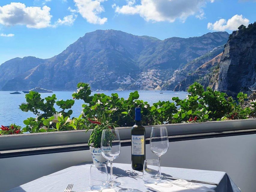 From Amalfi: 7H Amalfi Coast - Group Tour by boat - Comfort on the water: drinks, towels, shower, and small-group energy
