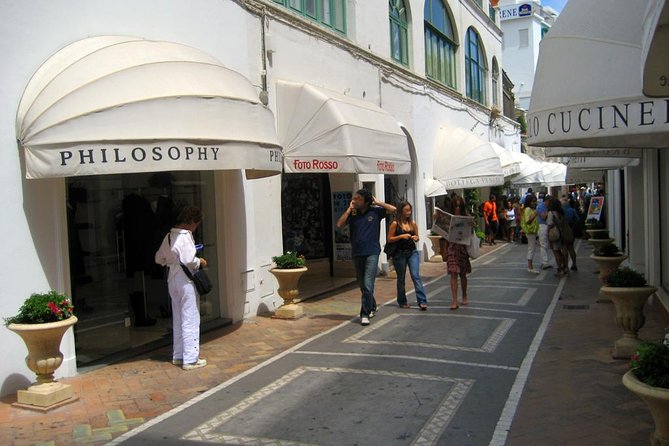 From Amalfi Coast: Capri & Anacapri guided tour by sea & by land - Capri town walking tour: Piazzetta and the lanes you actually want