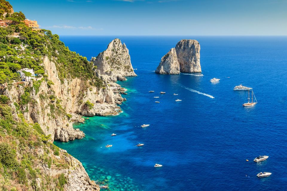 From Amalfi Coast: Capri and Anacapri Full-Day Guided Trip - The included boat tour around Capri: Faraglioni, grotto options, and the best angles