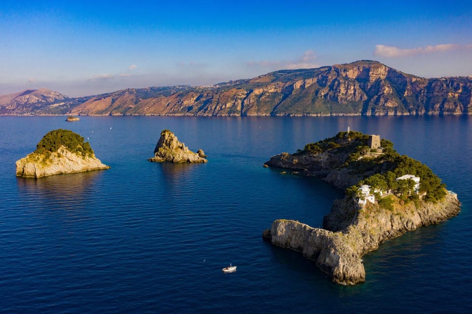 From Amalfi: Group Boat Tour to Capri with Swimming - Another swim stop near Capri: cool off before you head back