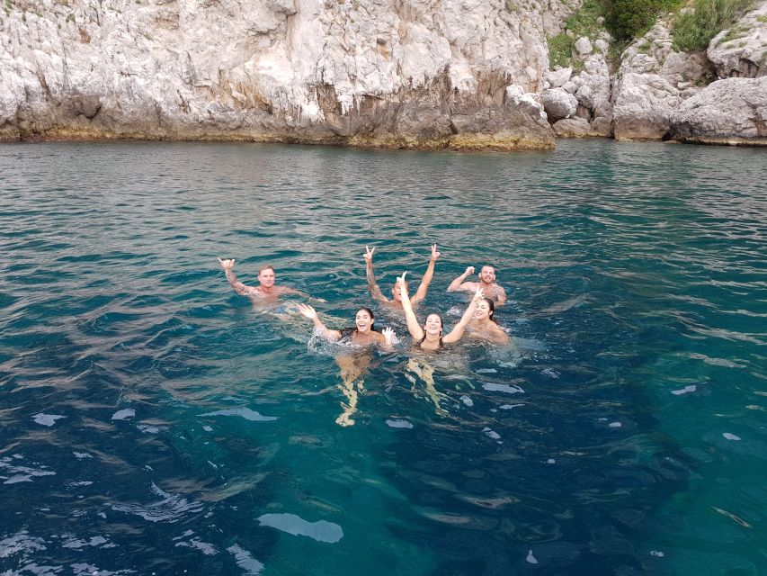 From Amalfi: Small Group Boat Excursion to Capri Island - The boat ride: snacks, drinks, and sea-level storytelling