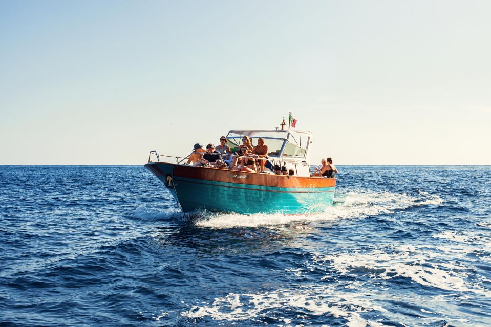 From Amalfi: Small Group Boat Excursion to Capri Island - First look at Capri from the water: White Grotto, Faraglioni, and Marina Piccola