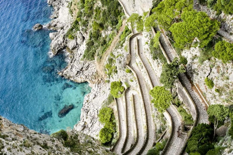 From Capri: Highlights Tour with Chairlift Ticket - Capri Town and La Piazzetta: narrow streets, shopping energy, and lemoncello