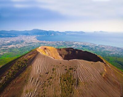 From Naples_ Vesuvius transfer+ticket and digital audioguide - Pompeii stop: streets frozen in ash, with the lupanar and frescoes