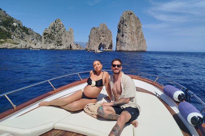 From Positano : Elite Capri Boat Day Free Bar, Brunch & City Walk - Roman-coast favorites: Spiaggia Grande, Bagni di Tiberio, and Capri’s beachy side