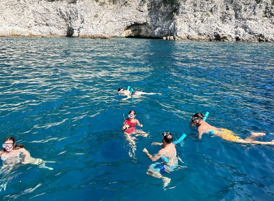 From Positano: Half-Day Amalfi Coast Boat Tour & Snorkeling - The onboard part that actually matters: drinks, fruit, limoncello, and prosecco