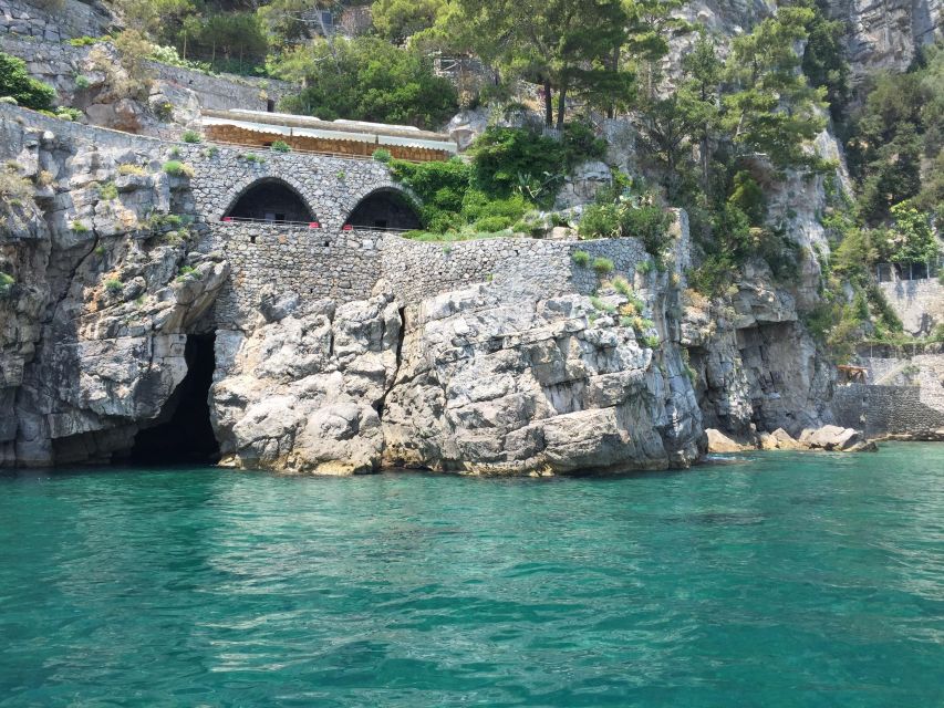 From Praiano: Amalfi Coast Guided Private Cruise with Drinks - Conca dei Marini and Amalfi: sea-cave coastline at boat-speed