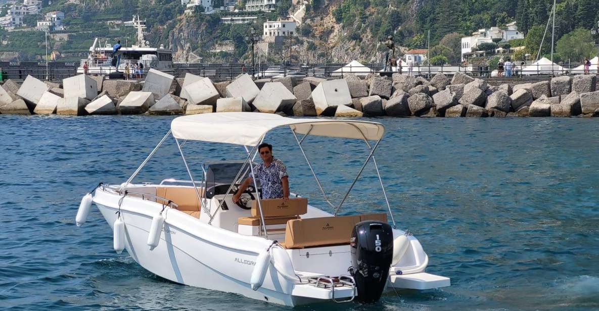 From Sorrento: Full Day Capri Private Boat Trip with Drinks - Faraglioni views and grotto sightings: the sea portion that makes this worth it