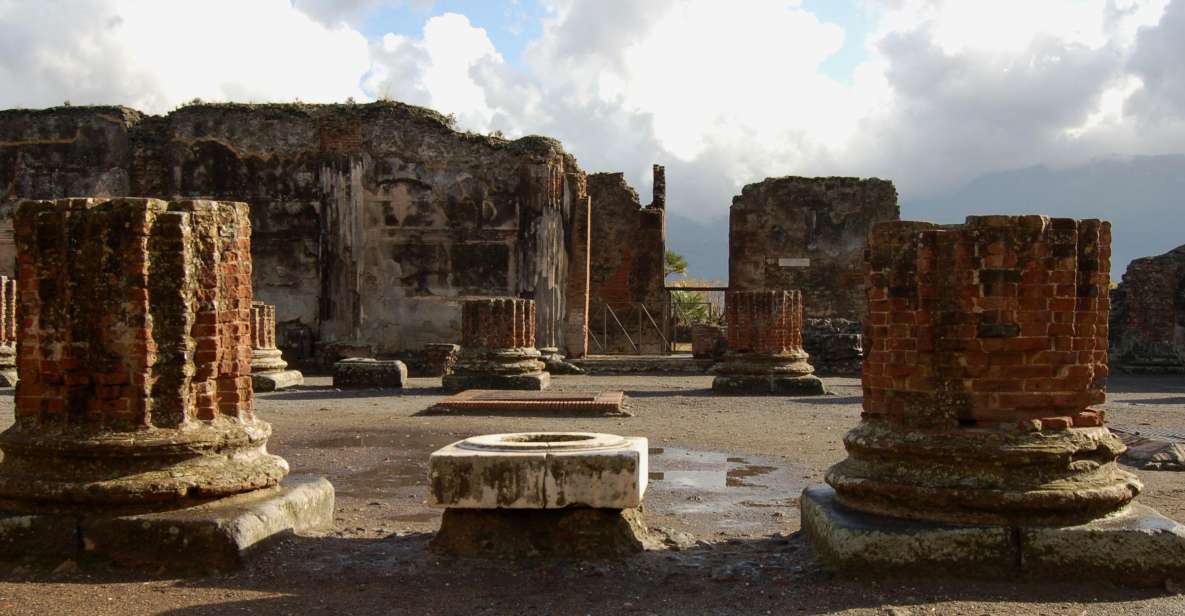 From Sorrento: Herculaneum and Pompeii Group Excursion - Pompeii walkthrough: streets, baths, forums, and frescoed villas