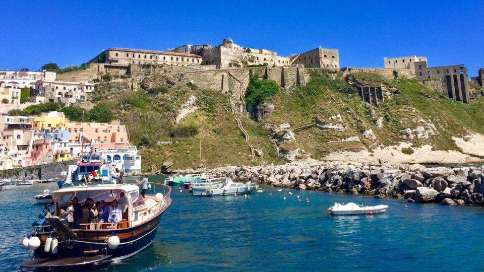 From Sorrento: Ischia and Procida Boat Tour with Snorkeling - Ischia from the sea: Aragonese Castle and Maronti Beach before you even step ashore