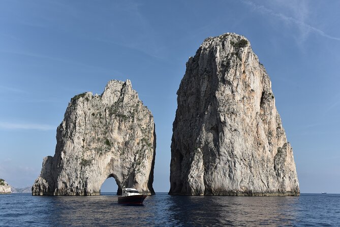 From Sorrento/Nerano: Capri Shared Tour - without pick up - The sea tour route: grottos, Punta Carena lighthouse, Faraglioni, and a natural arch