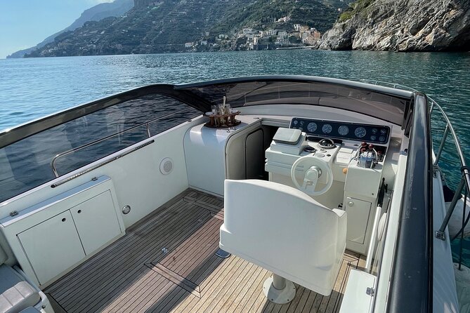 Full Day Private Boat Tour of the Amalfi Coast - Boat comfort: lounge space, bathroom access, and swim-ready layout
