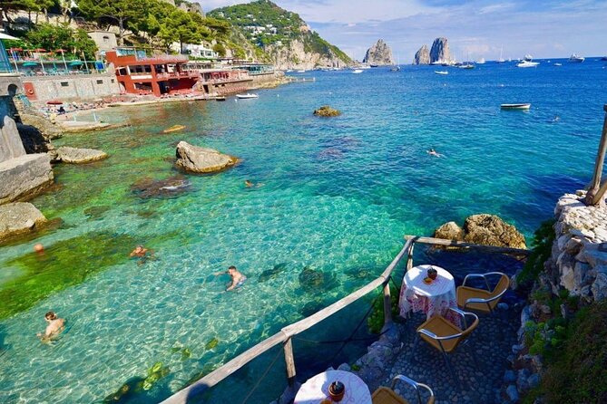 Full Day Private Boat Tour to Capri from Positano - Capri First Landing: Marina Grande, Bagni di Tiberio, and the Classic Shoreline Vibe