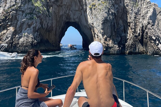 Full day private boat tour to the Island of Capri - Faraglioni: your best hour for the rocks that define Capri