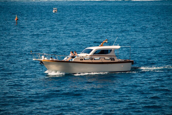 Full-Day Private Guided Boat Tour in Capri - Stop 3: Grotta Verde quick swim in a color-changing cave