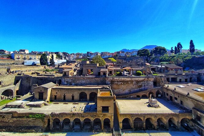 Guided Tour of Pompeii and Herculaneum with Lunch and Ticket - Pompeii Arrival: Reserved Entry and a Guided City-Center Walk