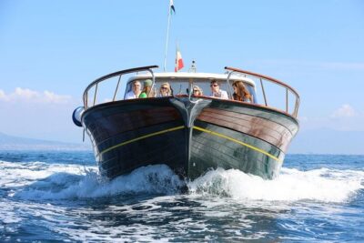 Positano & Amalfi Boat Tour from Sorrento: Swim & Light Lunch - The Sorrento warm-up cruise: Marina Grande, Roman ruins, and a cliff waterfall