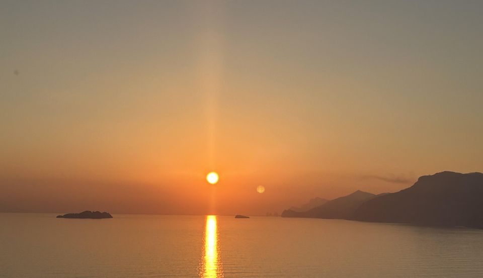 Positano: Amalfi Coast Sunset Group Boat Tour with Prosecco - Fiordo di Furore: the photo stop where the cliffs feel close