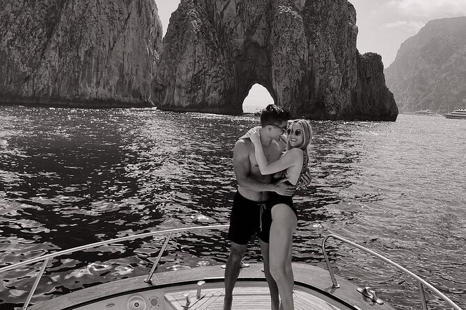 Positano , Praiano to Capri private boat tour - Faraglioni and a good-luck pass through the arch