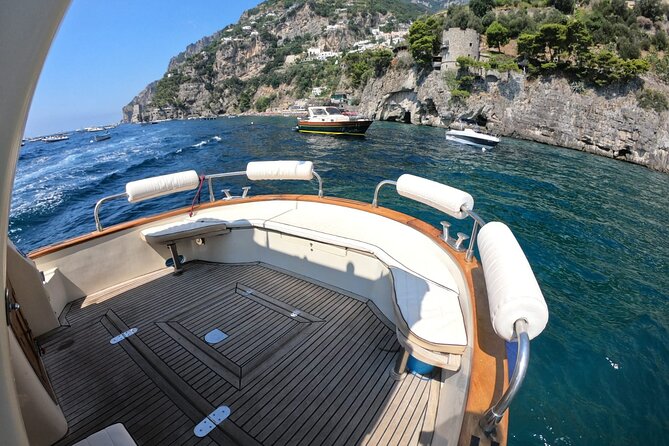 Private Amalfi Coast Boat Tour from Positano: Swim & Explore - Amalfi on shore: Duomo area time and Cartiera + limoncello tasting